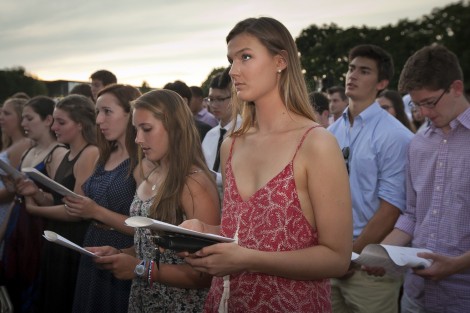 New students sing the alma mater for the first time.