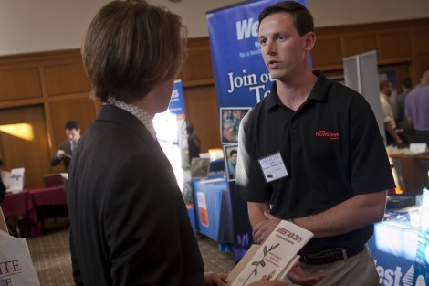 Stephen Schappert ’14 of Flowserve Corp. speaks with students.