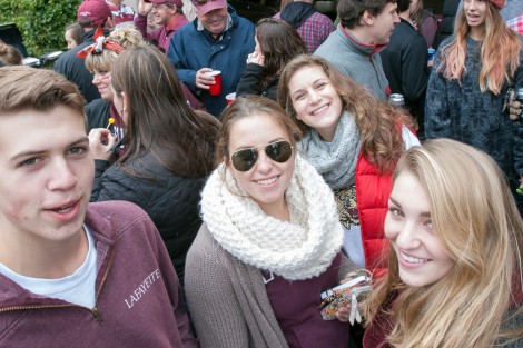 Alumni, students, and families have a good time during the tailgate in Markle Parking Deck.