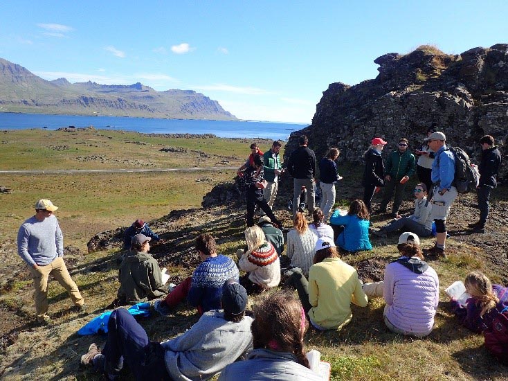 Professor Dave Sunderlin gives the class a lecture at Djúpavogshreppur, Iceland.