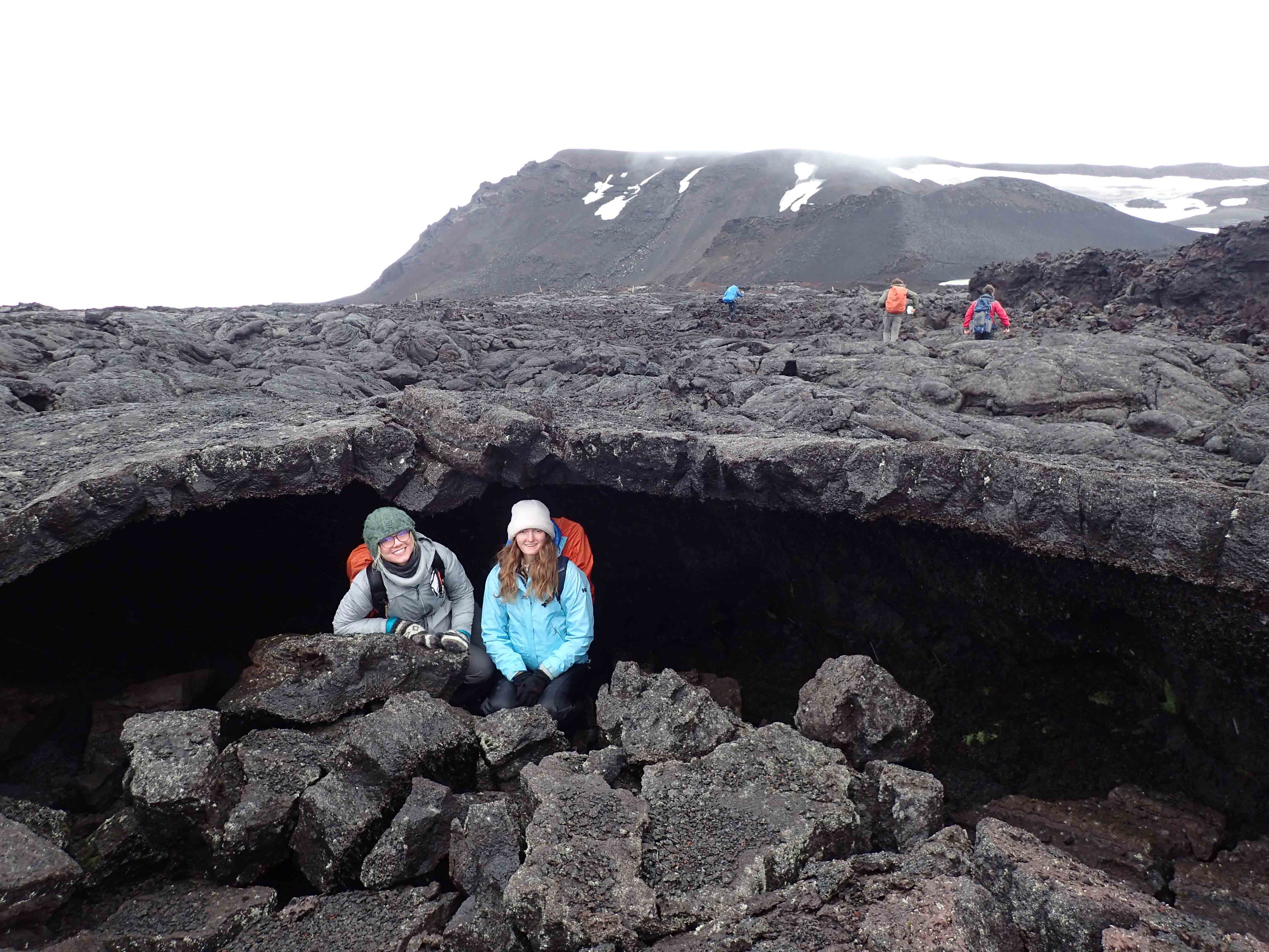 Cecelia Palmquist ’20 and Agata Benbenek ’20 in a “lava tube” at Askja Caldera, Iceland