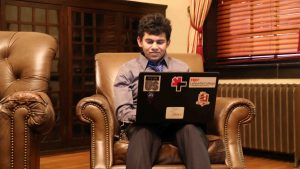 Ali Ehsan '18 works on his laptop.