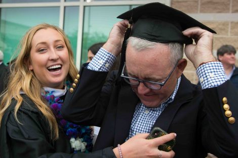 A daughter and father after Commencement