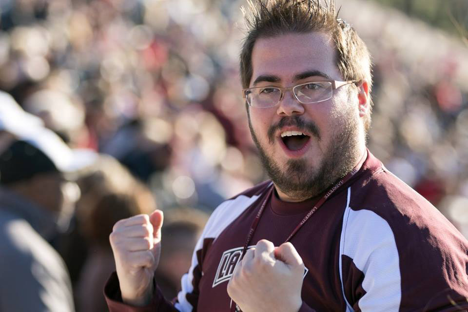Ryan Dupuis at a Lafayette football game when he was student director of the Pep Band.