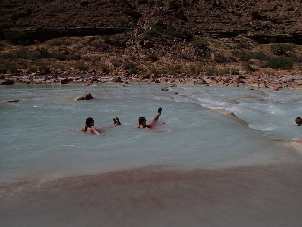 On a warm-water respite from the chilly Colorado River, students “body rafted” in the warmth of the Little Colorado River as part of the Grand Canyon rafting trip.