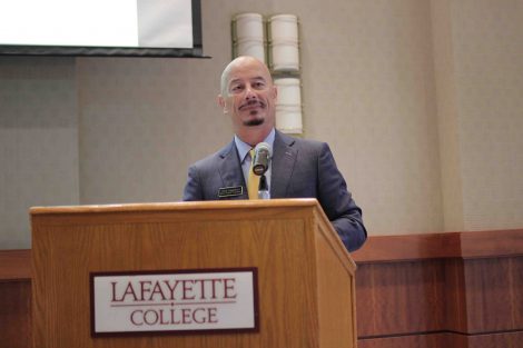 Chris Englebert stands at the podium at the annual Meyner Center Annual Forum on Local Government.