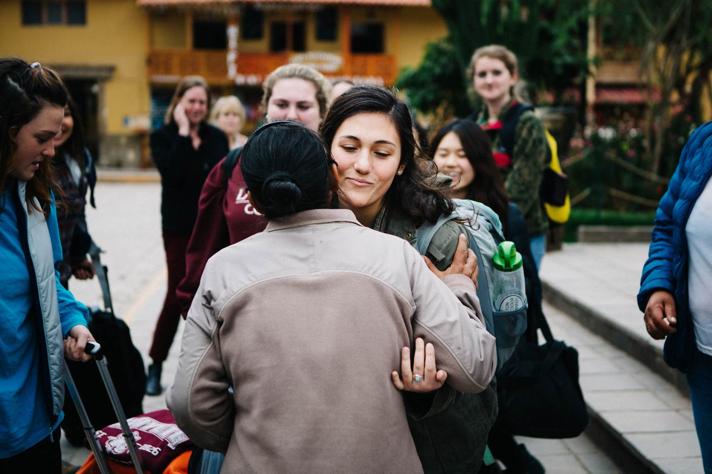 Claire Grunewald in Peru gives a hug during her trip to Peru.