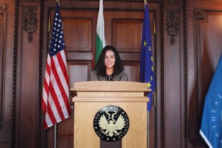Mila Temnyalova '19 stands at a podium