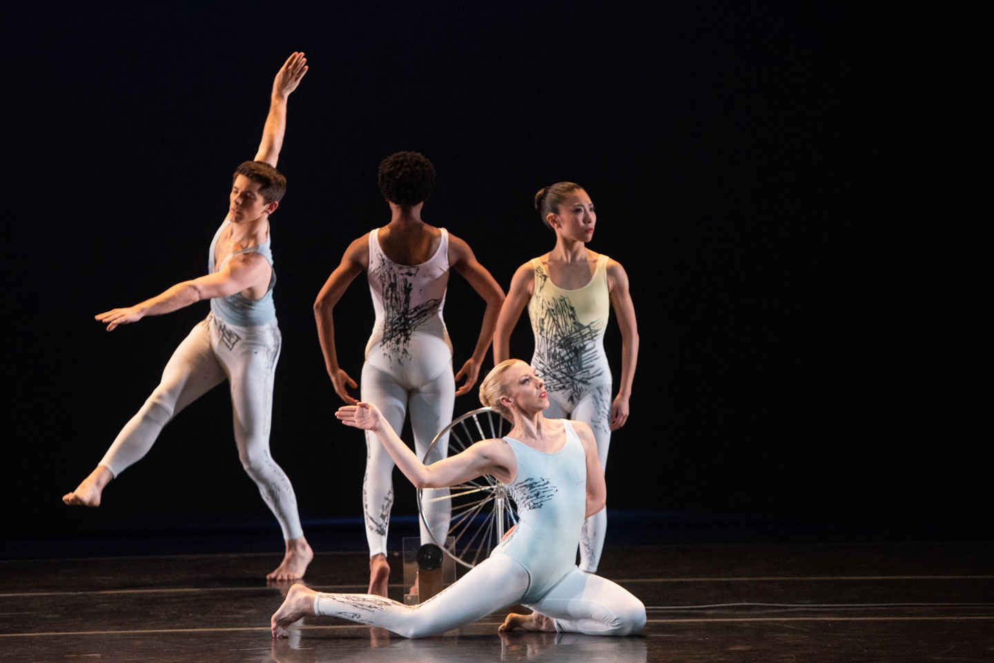 Four Taylor 2 Dance dancers perform on stage at Lafayette College's Williams Center for the Arts.