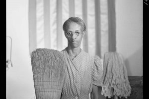 Gordon Park's famous image of a woman with a mop and broom.