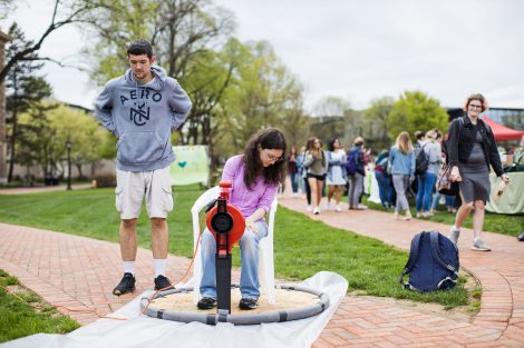 students on the quad enjoying sustainable activities presented by student groups on campus