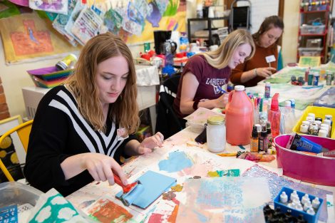 Students making preparations at The Journey Home, an art-based program for women inmates at Northampton County Prison