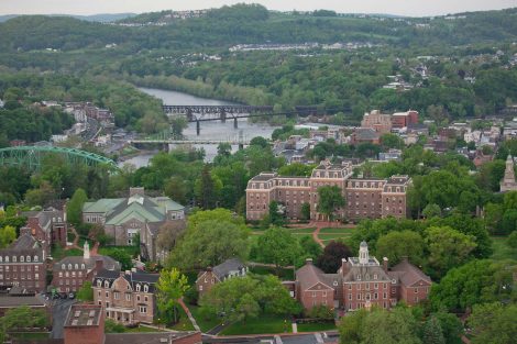 An aerial view of Lafayette College's campus and the river behind it