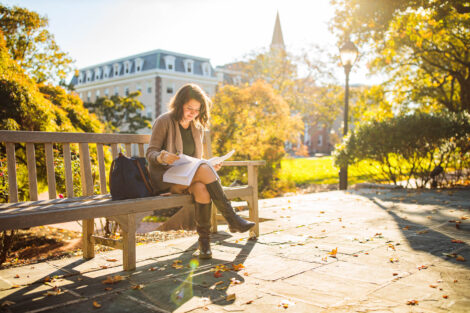 students set against the beautiful oranges and yellows of fall scenery at Lafayette