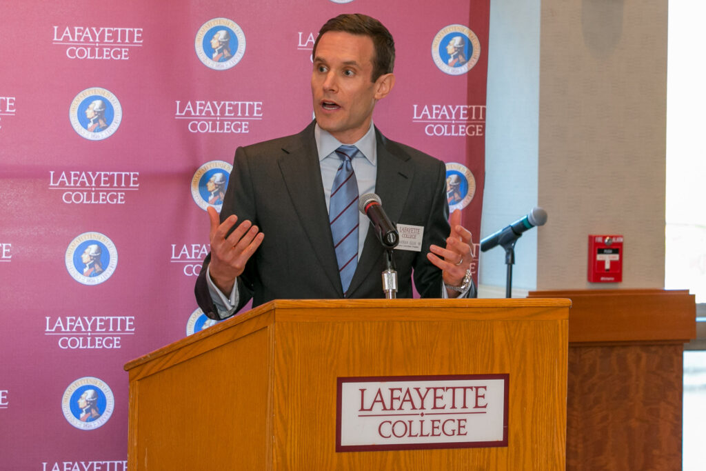 Jonathan Ellis speaks at a Lafayette College podium