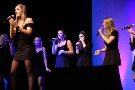 students sing at the a cappella concert in Williams center for the arts