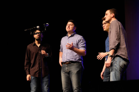 students sing at the a cappella concert in Williams center for the arts