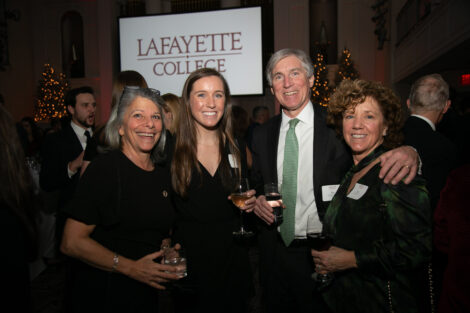 Alumni, students, and friends of the college gather to celebrate the holidays in new york
