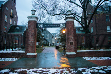 Snow dusts the campus at dusk