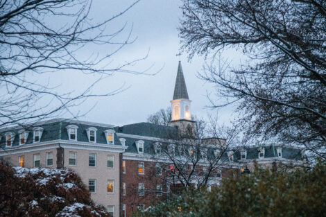 Snow dusts the campus at dusk