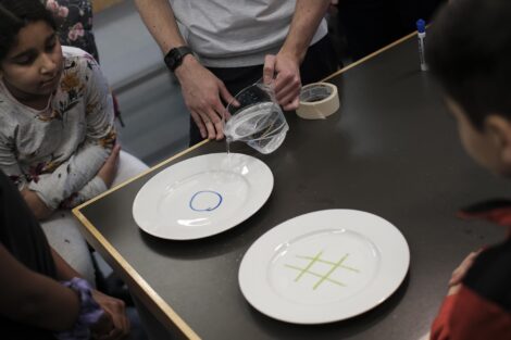 Two plates with two different symbols drawn by two different markers