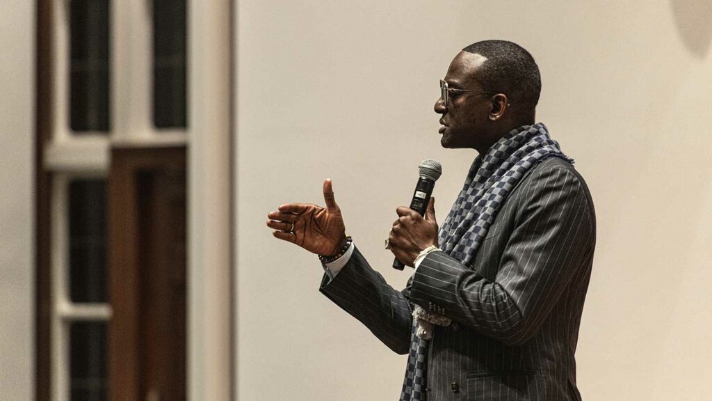 Yusef Salaam speaks to an audience in Colton Chapel
