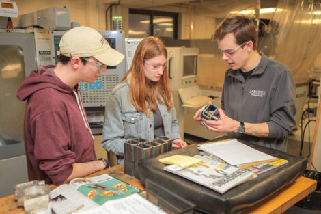 students work on a project in an engineering lab