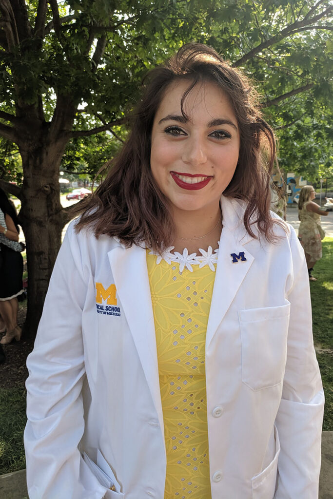 Kenzie Corbin in medical school white jacket