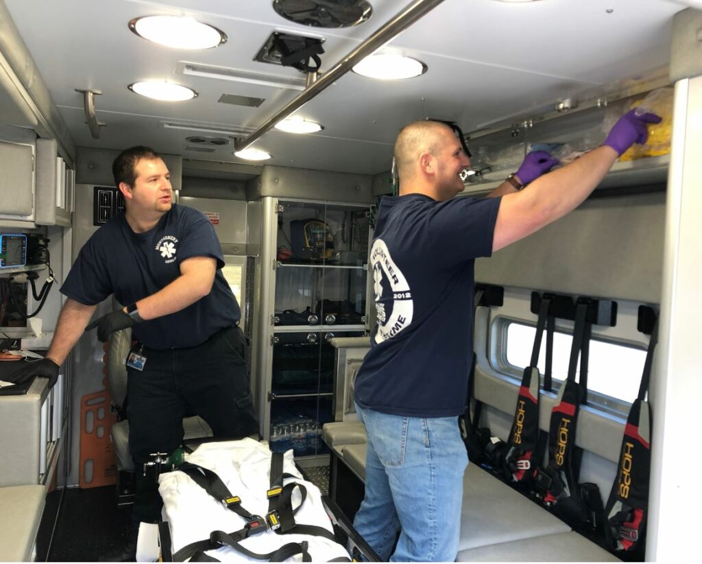 Joe Prati'13 (left) and Matt Wierzbicki ’21 work as EMTs in their community