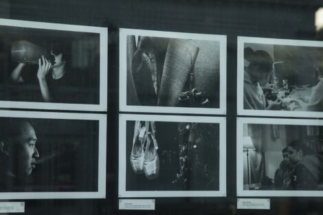 Images taken by student photographers on display in windows