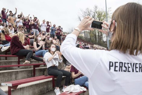 Lafayette College President Alison Byerly taking photo Rivalry 156