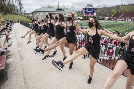 Lafayette College dance crew kicks up their legs in front of Fisher Field