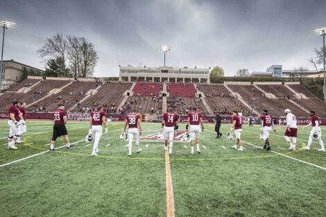 Lafayette College football players take the field