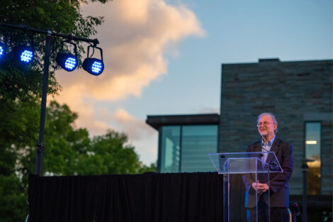 Jerry Greenfield speaks at a podium.