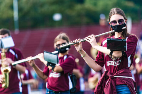 Band members play flutes.