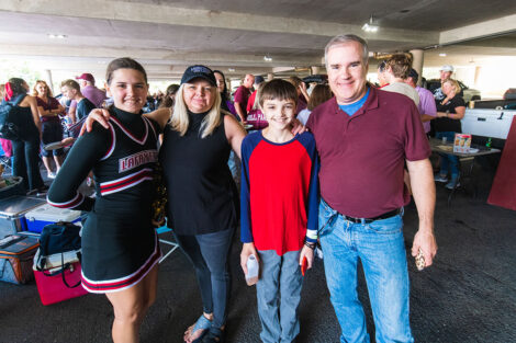 Families mingle on Markle Parking Deck while tailgating.