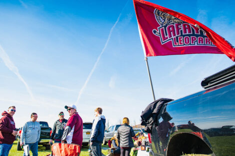 Lafayette Leopard flag is attached to a truck near where alumni are tailgating