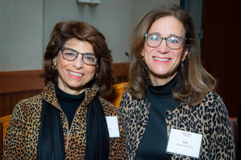 Laurie Samet ’79 and Lisa Kassel ’79 are both wearing leopard print and stand for a picture after accepting the Lafayette College Fund Award.