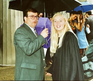 Photo shared by Mira von Roon Brand taken during her Commencement in 1992 with Barry McCarty, former dean of enrollment.