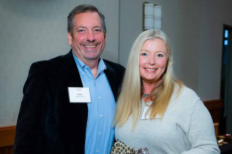 Chuck Bachman, retired senior associate director of Admissions with Mira van Roon Brand '92, recipient of the Barry McCarty AAR of the Year Award