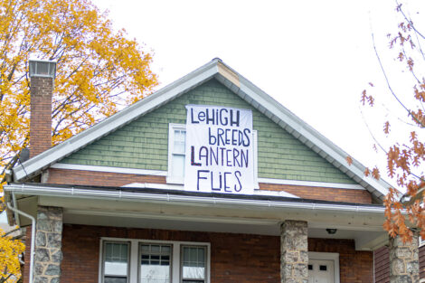 A banner hanging in College Hill reads: Lehigh breeds Lantern Flies