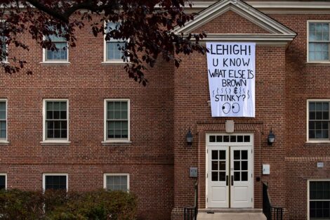 A banner hanging in College Hill reads: Lehigh, U know what else is brown and stinky?