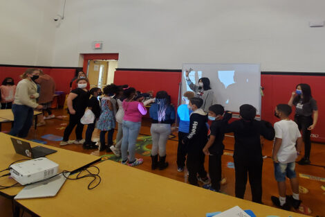 Lisa Gabel's neuro class leads students at Paxinosa Elementary School through a brain exercise as part of Connected Classrooms, Nov. 2021