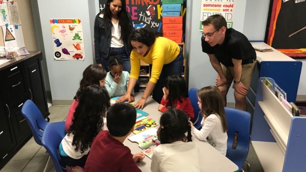 Diana De La Torre '20 helps deliver a Connected Classrooms unit at Easton YMCA