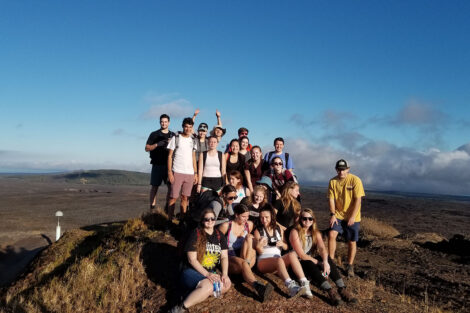 Study Abroad Hawaii students gather at the summit of Mauna Ulu.