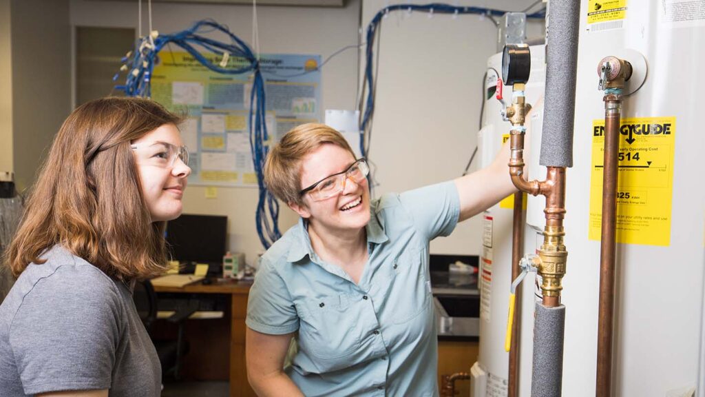 Amy Van Asselt (left), assistant professor of mechanical engineering, is part of an interdisciplinary team exploring using compressed-air energy storage to power Lafayette's campus.
