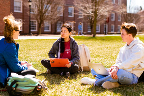 students sitting with laptops in Anderson Courtyard