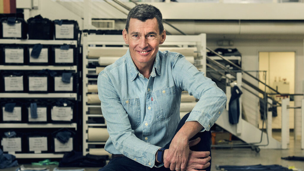 Head shot of Chip Bergh sitting in Levi Strauss & Co. warehouse