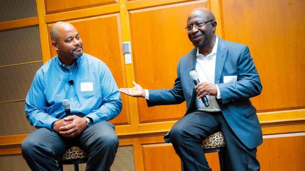 Harrison Bailey '95 and Professor Rexford Ahene discuss mentoring at the McDonogh Awards