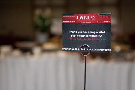a Landis thank you sign sits on a table